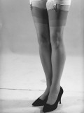 Woman Wearing Stockings Photographic Print by George Marks