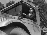 Woman Driving Truck Photographic Print by George Marks