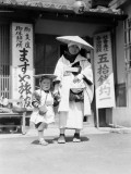 Buddhist Pilgrim Mother and Child Wearing Traditional Costume, Begging For Donations, Kobe Photographic Print by Charles Phelps Cushing