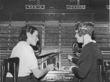 Two Female Switchboard Operators Connecting International Calls Photographie
