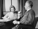 Man Talking, Woman Taking Notes Photographic Print