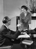 Woman Giving Cup To Man Photographic Print