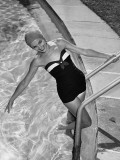 Woman in Swimming Pool Posing on Steps Photographic Print