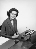 Woman Typing, Posing and Smiling Photographic Print