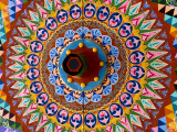 Colorful Wheel For Carriages, Costa Rica Photographic Print by Bill Bachmann