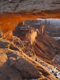 Landscape Through Mesa Arch at Sunrise, Canyonlands National Park, Moab, Utah, USA Photographic Print by Walter Bibikow