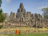 Monks Looking at Bayon Temple, Angkor, Siem Reap, Cambodia Photographic Print