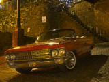 Antique Red Cadillac Parked in the Historic District, Savannah, Georgia, USA Photographie par Joanne Wells