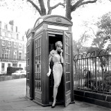 Lucinda in a Telephone Box, London, 1959 Print by Georges Dambier
