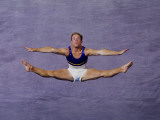 Male Gymnast Performing on the Floor Exercises Photographic Print