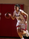 High School Girls Basketball Player in Action Photographic Print