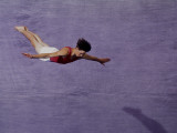 Male Gymnast Performing on the Floor Exercises Photographic Print