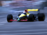 Blurred F1 Auto Racing Action Photographic Print