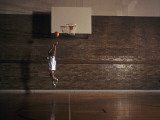 Young Boy Practicing his Basketball Shooting Photographic Print