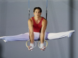 Male Gymnast Performing on the Rings Photographic Print