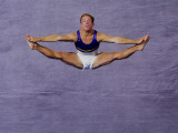 Male Gymnast Performing on the Floor Exercises Photographic Print