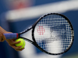 Detail of Tennis Player Holding the Racquet and Ball About to Serve Photographic Print