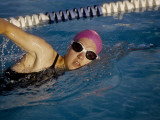 Female Swimmer Exercising in a Pool Photographic Print