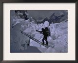 Climbing Across Ladder on Everest, Nepal Prints by Michael Brown