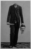 Decapitated Man with Bloody Knife Holding His Head Masterprint