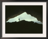 Potholer Silhouetted at Exit to Underground Cave System, Huesco, Spain Prints by Inaki Relanzon