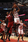 Miami Heat v Chicago Bulls - Game Two, Chicago, IL - MAY 18: Derrick Rose and Chris Bosh Photographic Print by Jonathan Daniel