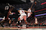 Miami Heat v Chicago Bulls - Game One, Chicago, IL - MAY 15: Dwyane Wade and Derrick Rose Photographic Print by Jonathan Daniel