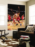 Philadelphia 76ers v Toronto Raptors: Jose Calderon and Jrue Holiday Wall Mural by Ron Turenne