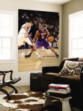 Los Angeles Lakers v New Jersey Nets: Kobe Bryant and Devin Harris Wall Mural by Andrew Bernstein