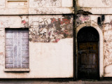 Derelict Front of Buidling with Door and Window Photographic Print by Clive Nolan