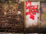 Derelict Door with Graffiti 5 Photographic Print by Clive Nolan