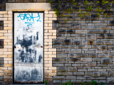 Derelict Door with Graffiti 4 Photographic Print by Clive Nolan