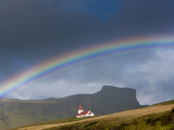 Rainbow over Church, Vik, Iceland Photographie par Peter Adams