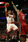 Miami Heat v Chicago Bulls - Game Five, Chicago, IL - MAY 26: Derrick Rose and LeBron James Photographic Print by Jonathan Daniel