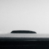 An Island Shrouded in Mist Photographic Print by Clive Nolan