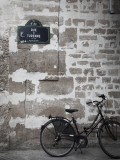 Bicycle and Street Sign, Paris, France Photographic Print by Jon Arnold