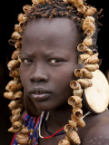 Portrait of Mursi Girl, Omo Valley, Ethiopia Photographie par Peter Adams