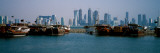 Harbor with Skylines in the Background, Dhow Harbour, Doha, Ad Dawhah, Qatar 2010 Lámina fotográfica