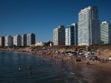 Tourists on the Beach, Millennium Tower, Playa Mansa, Punta Del Este, Maldonado, Uruguay Photographic Print