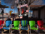 Multi-Colored Chairs at a Sidewalk Cafe, Route 66, Seligman, Yavapai County, Arizona, USA Photographic Print Multi-Colored Chairs at a Sidewalk Cafe, Route 66, Seligman, Yavapai County, Arizona, USA Photographic Print