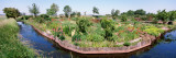 Garden Along a River, North Holland, Netherlands Lámina fotográfica Garden Along a River, North Holland, Netherlands Lámina fotográfica