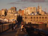 People on a Pier, Escollera Sarandi, Montevideo, Uruguay Photographic Print