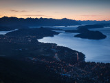 High Angle View of a Coastal Town Lit Up at Dusk, Lake Nahuel Huapi, San Carlos De Bariloche Photographic Print