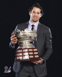 Ryan Kesler with the Frank J. Selke Trophy Photo