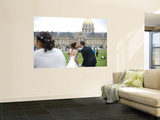 Wedding Couple Kissing with Les Invalides in Background Wall Mural by Lou Jones