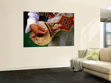 Playing Guitar at Norbulingka Reproduction murale géante par Juliet Coombe