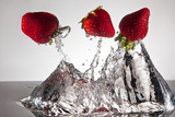 Three Stawberries FreshSplash Photographic Print by Steve Gadomski