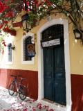 Colourful Alleyway and Entrance to Taverna Larenzo, Rethymnon Old Town, Crete, Greece Photographic Print by Steve Outram