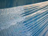 Playa Del Carmen, Mexico; a Hammock Hanging on a Wall in a Hotel Fotografisk trykk av Dan Bannister Playa Del Carmen, Mexico; a Hammock Hanging on a Wall in a Hotel Fotografisk trykk av Dan Bannister