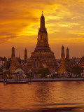 Thailand, Bangkok, Wat Arun ,Temple of the Dawn and Chao Phraya River Illuminated at Sunset Photographic Print by Gavin Hellier
